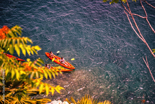 Amalfi, Italy - June 24, 2024: Aerial View of a Kayaker on Clear Waters, Top-down perspective of a kayaker in a kayak or canoe boats navigating the crystalline blue waters of Mediterranean Sea