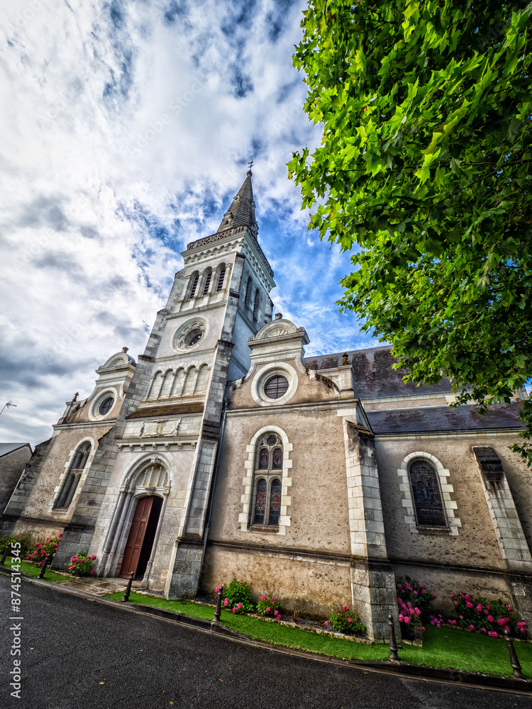 Fototapeta premium Église de Contres - French Church Under Cloudy Sky