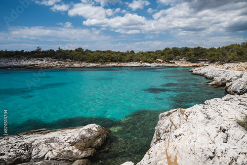 Beautiful turquoise blue sea along the rocky coast of Atspas beach on the island of Thasos in Greece