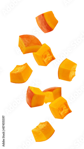 Cuadro en lienzo Falling piece of pumpkin, cubes, isolated on white background, full depth of fie