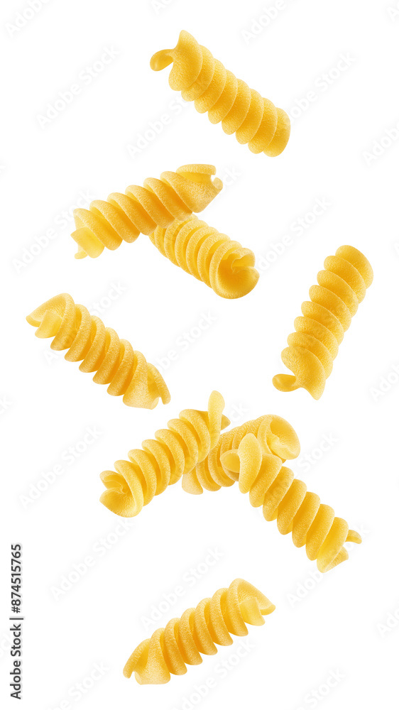 Falling raw Fusilli, Rotini, uncooked Italian Pasta, isolated on white background, full depth of field Falling raw Fusilli, Rotini, uncooked Italian Pasta, isolated on white background, full depth of field