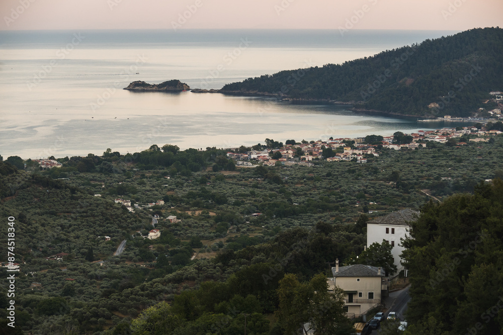 Fototapeta premium View from the village of Panagia to the Golden Beach and a small island nearby on the island of Thasos, Greece