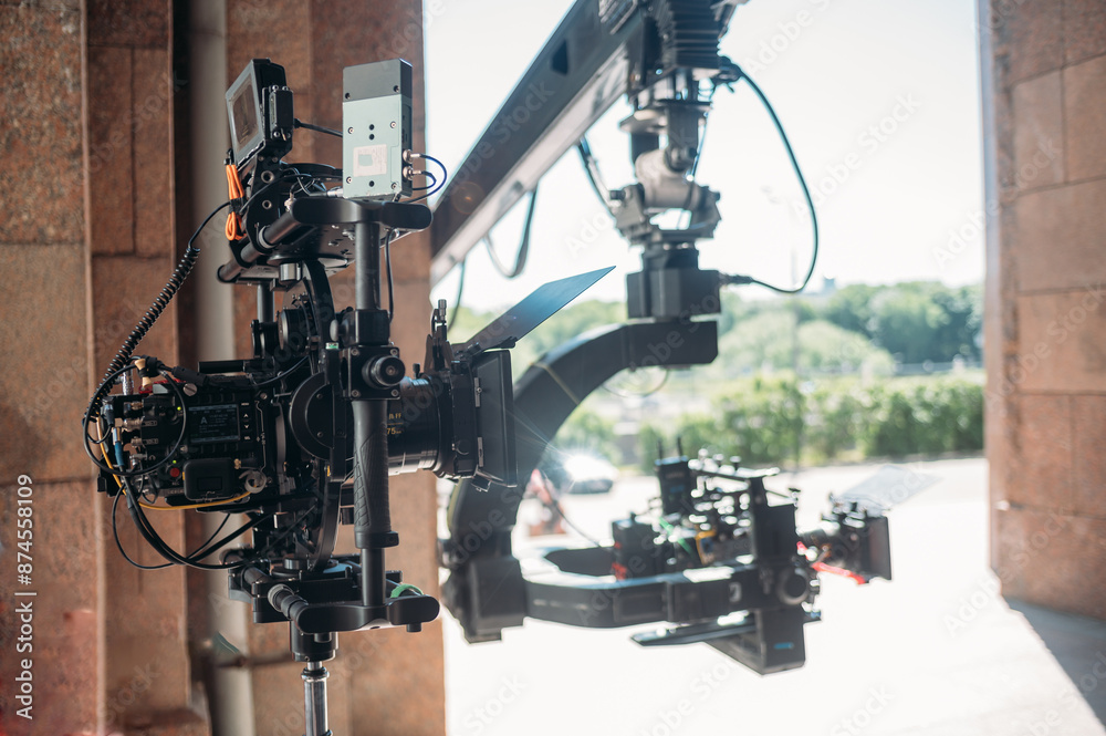 Professional film and video camera on the set. Shooting shift, equipment and group. Professional film and video camera on the set. Shooting shift, equipment and group.