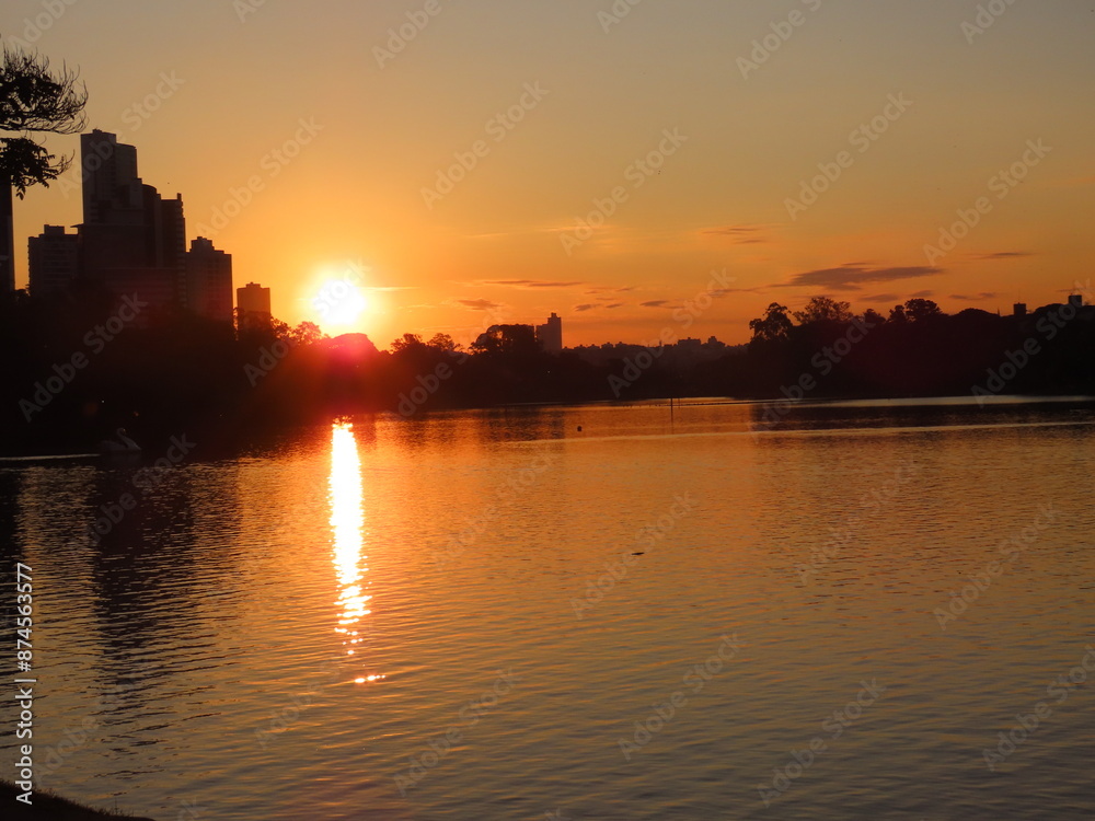 Naklejka premium sunset over the river