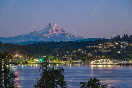 USA, Oregon, Hood River: Mount Hood rises above the riverfront in this scenic view of a small tourist town in the Columbia River Gorge.
