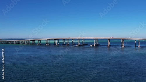 Drone flying towards the Marler Bridge in Destin, Florida. photo