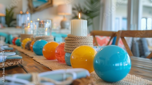 Indulge in a beachy brunch in this vibrant dining room adorned with colorful beach ball ornaments and nautical ropewrapped candle holders. photo