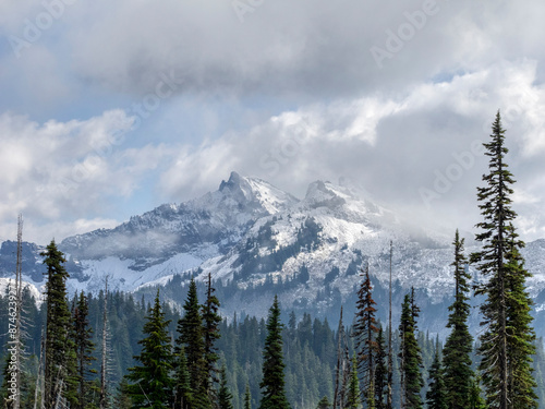 Washington State, Mount Rainier National Park. Tatoosh Range, snow covered peaks and clouds photo