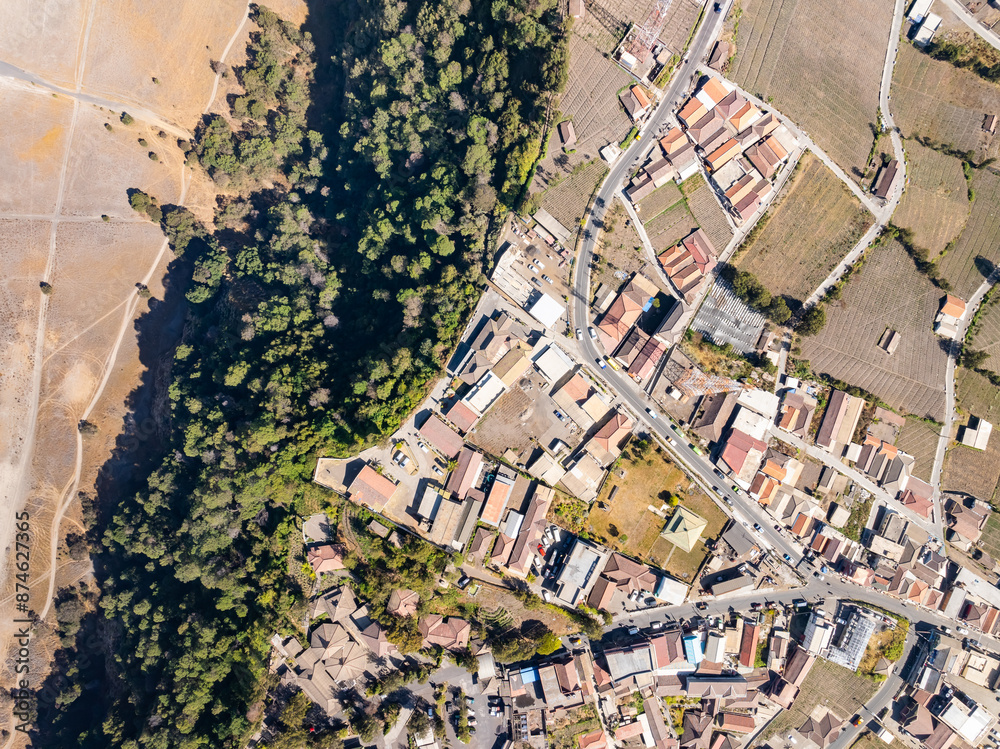 Naklejka premium Top view Village and Cliff at Bromo Volcano in Tengger Semeru national park, Java, Indonesia