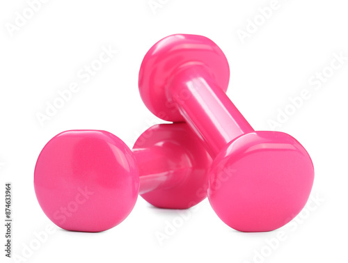 Pink dumbbells isolated on white. Sports equipment © New Africa