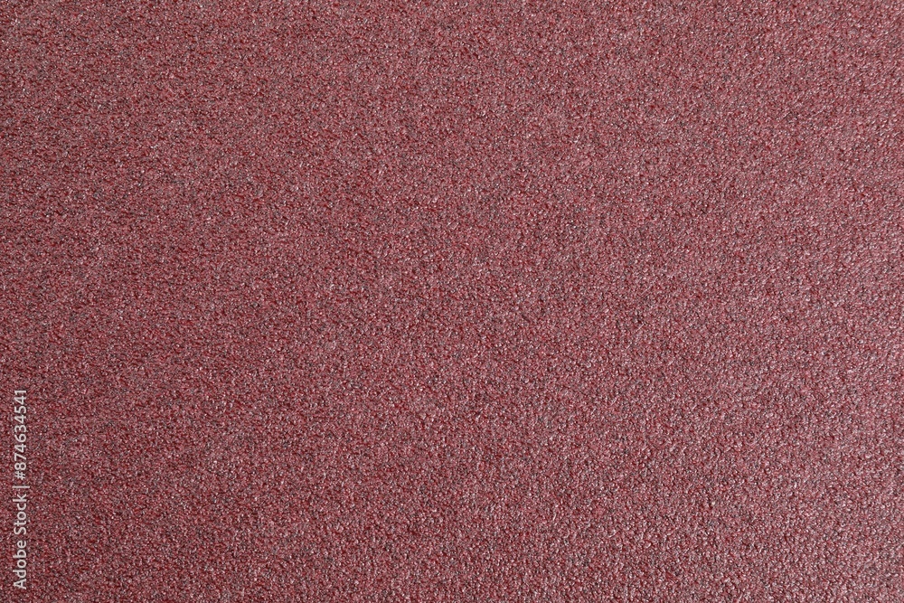 Fototapeta premium Texture of coarse sandpaper as background, top view
