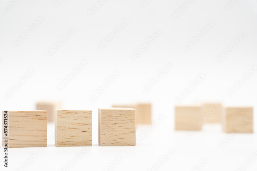 Wooden cube or wooden blocks on isolated background. Pile of wood block. Copy, empty space for text.