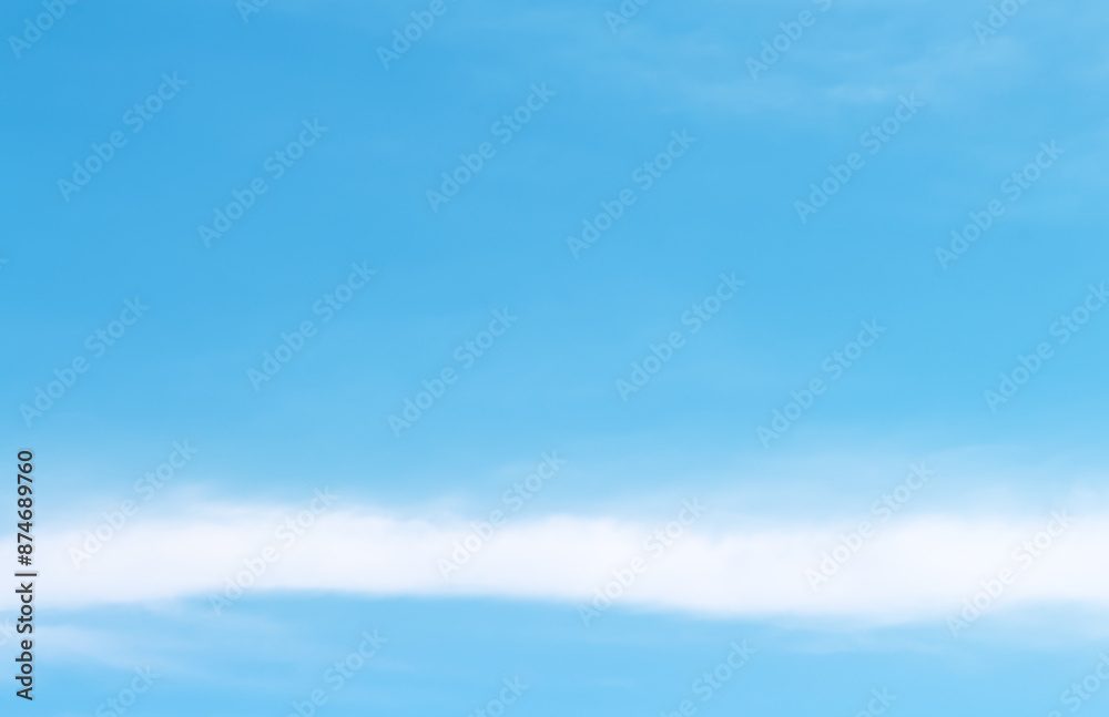 Clouds soft line patterns on bright blue sky background and vast space Clouds soft line patterns on bright blue sky background and vast space