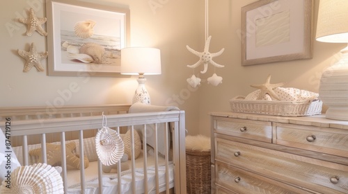 This neutral beachthemed nursery is genderneutral and soothing with a mix of weathered wooden accents and soft textures. The crib is adorned with a crochet sea creature mobile and a photo
