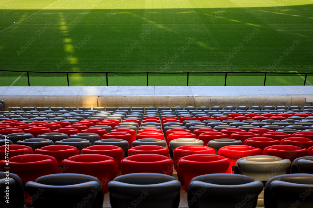 Naklejka premium stadium full of empty seats with a red and gray design