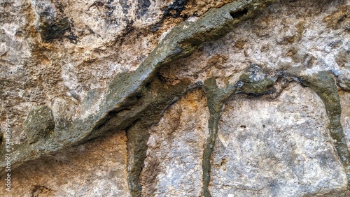 Background of stone wall texture. Close-up. Selective focus. photo