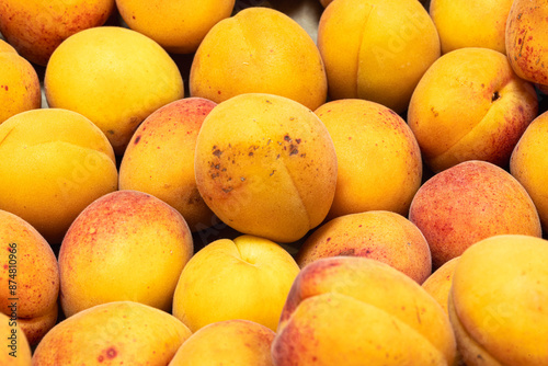 Apricots in very close-up on a market stall photo