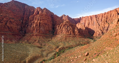 Desert landscapem mountain range, shrubs and wash in Ivins, Utah, United States of America. photo