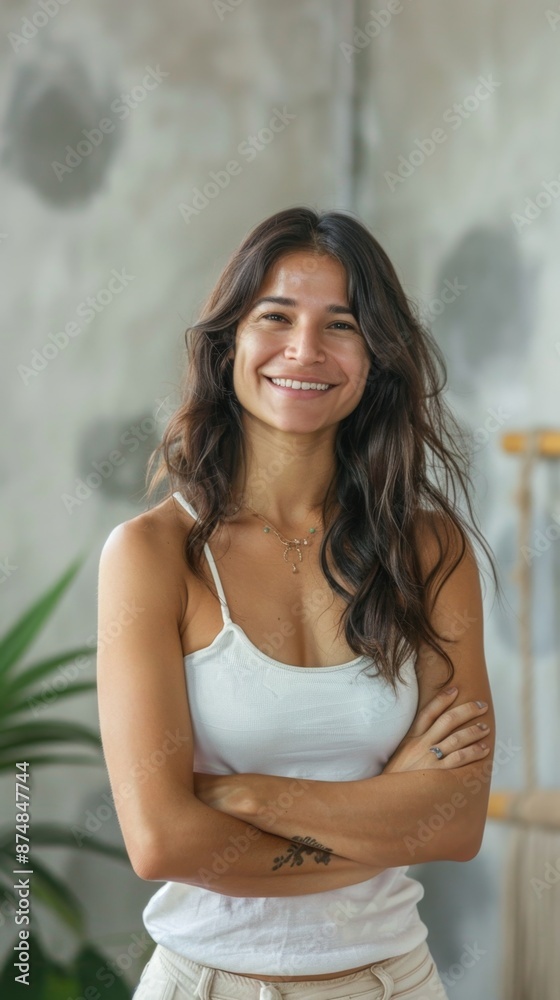 Fototapeta premium Confident and Happy Young Hispanic Female Health Coach and Yoga Instructor Advertising Wellness Retreat Courses in Yoga Studio - Labor Day Stress Relief and Mental Health Therapy