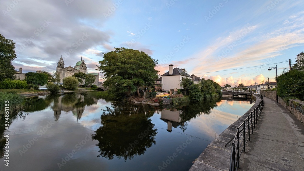 Galway cathedral reflected in the Corrib river in Galway city, Ireland, Irish landmark, buildings and architecture
