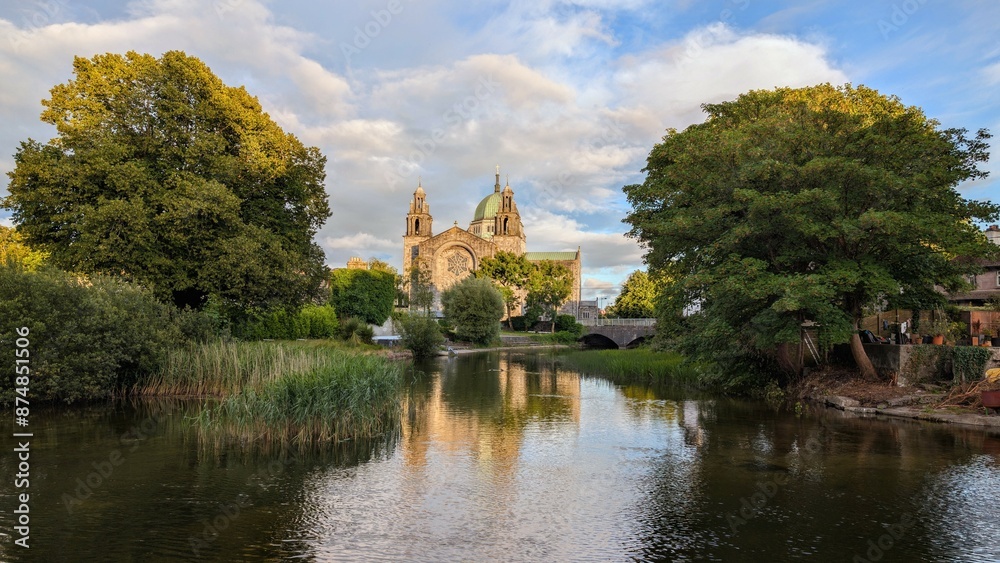 Galway cathedral reflected in the Corrib river in Galway city, Ireland, Irish landmark, buildings and architecture