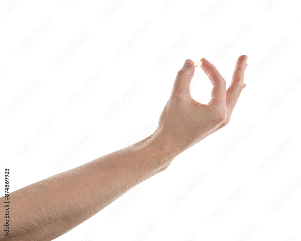 Male hand hold transparent pill isolated on white Male hand hold transparent pill isolated on white