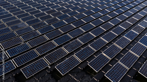 Aerial view solar cell panels farm power plant on water, Solar cell panels farm power plant eco technology alternative sustainable resources and renewable energy, Solar panel environment friendly.