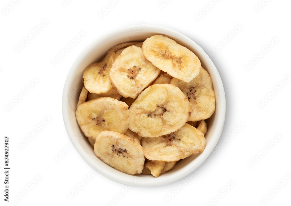 Bowl with dried healthy organic banana bites isolated on white background.Top view. Bowl with dried healthy organic banana bites isolated on white background.Top view.