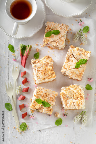 Sweet and delicious rhubarb yeast cake made of seasonal fruits.