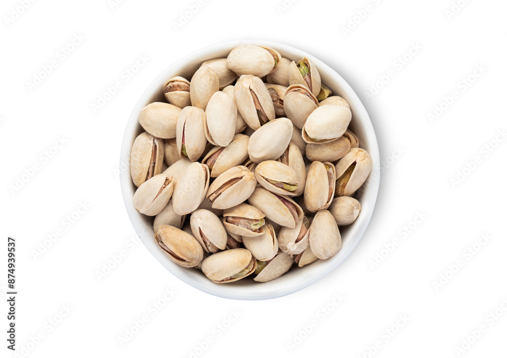 Bowl with salted pistachio nuts isolated on white background.Top view. Bowl with salted pistachio nuts isolated on white background.Top view.
