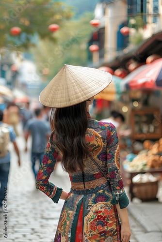 A Vietnamese lady wearing a traditional ao dai dress is walking along the ancient streets of Hanoi in a close-up shot