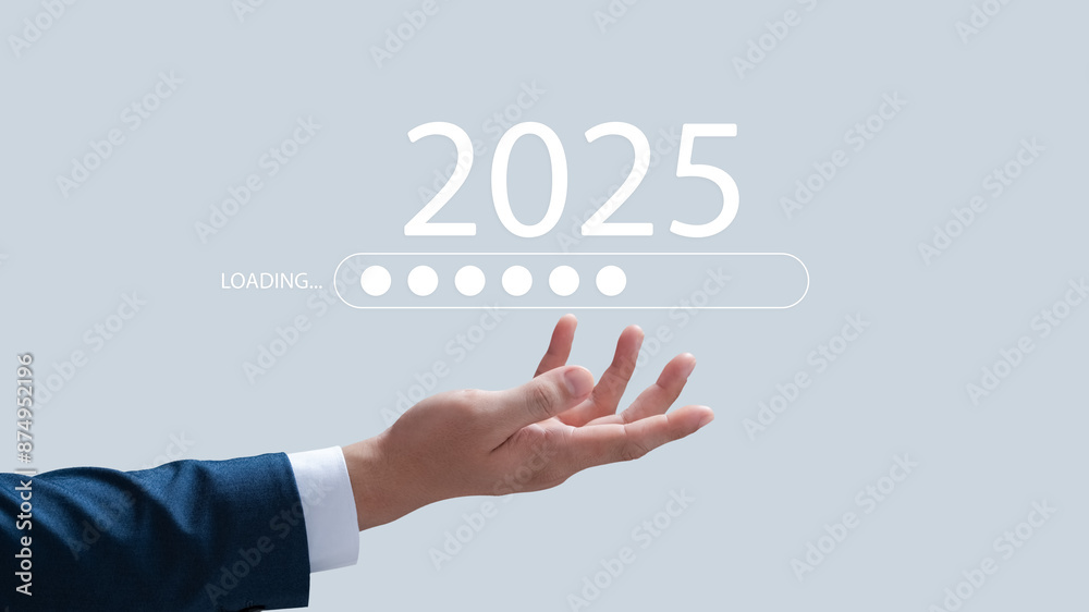 Businessman shows download bar counting down to 2025, New Year's Eve welcoming the new year from 2024 to 2025, developing towards success and sustainable growth concept. Businessman shows download bar counting down to 2025, New Year's Eve welcoming the new year from 2024 to 2025, developing towards success and sustainable growth concept.