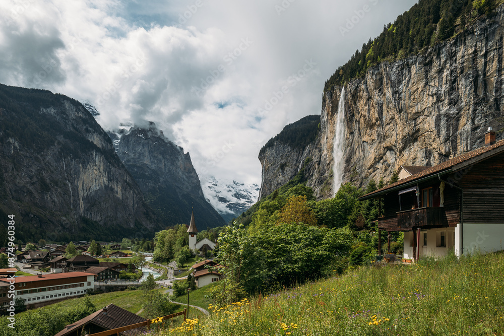 Explore a scenic Swiss valley with a waterfall, alpine village, and breathtaking natural landscapes Explore a scenic Swiss valley with a waterfall, alpine village, and breathtaking natural landscapes