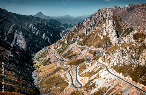 Quadro su tela Aerial view of the switchback and winding road on the mountain ridge near Tieli