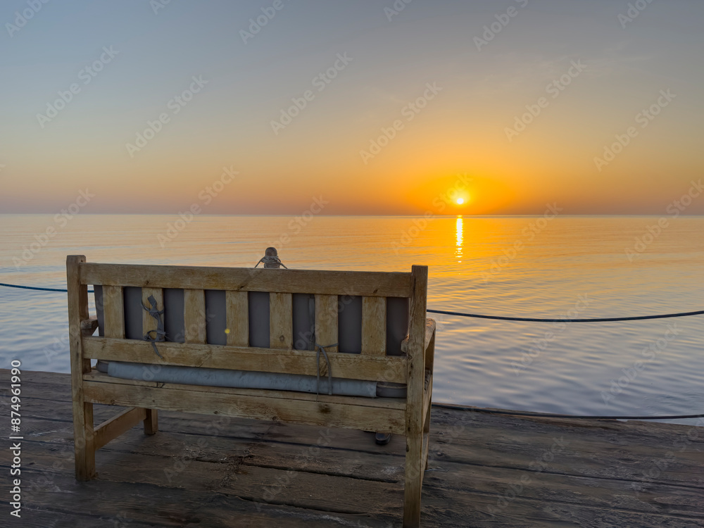 sunrise with wooden bench on the pier ,egypt sunrise with wooden bench on the pier ,egypt