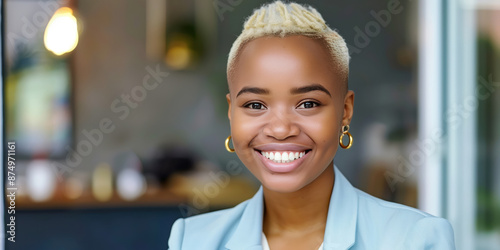 A happy young black businesswoman at work 
