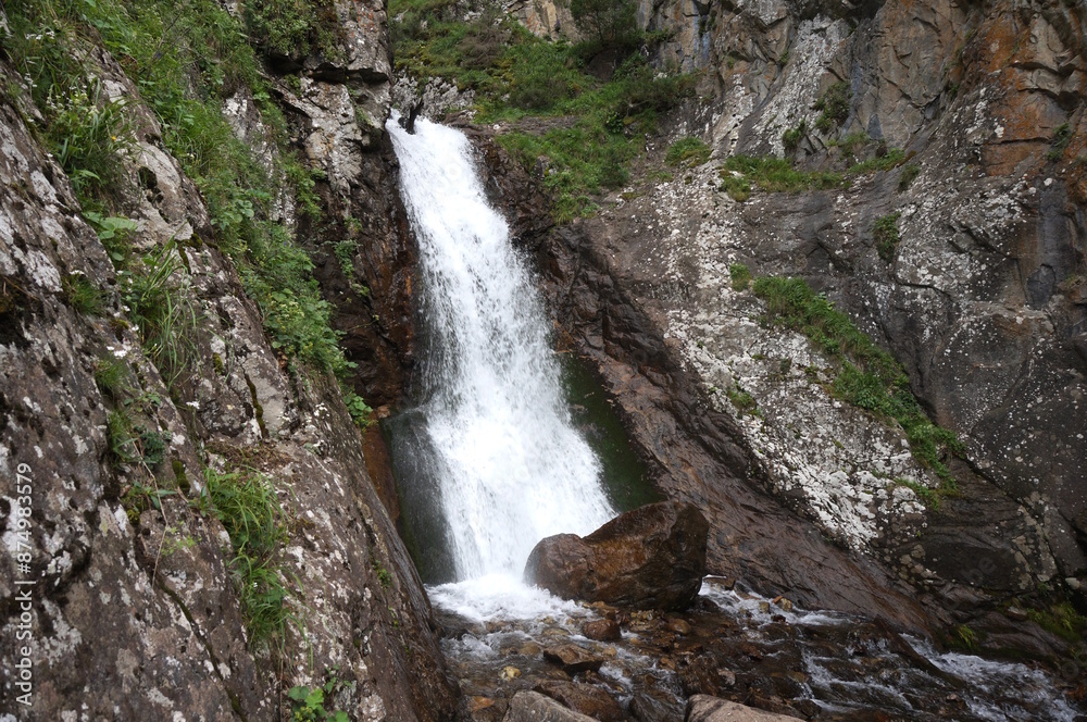 Shumka waterfall. It is located in dombay, a mountainous and wooded area. Shumka waterfall. It is located in dombay, a mountainous and wooded area.