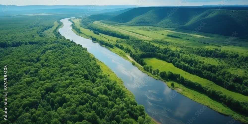 Picturesque landscape with a river flowing through a lush green valley Picturesque landscape with a river flowing through a lush green valley