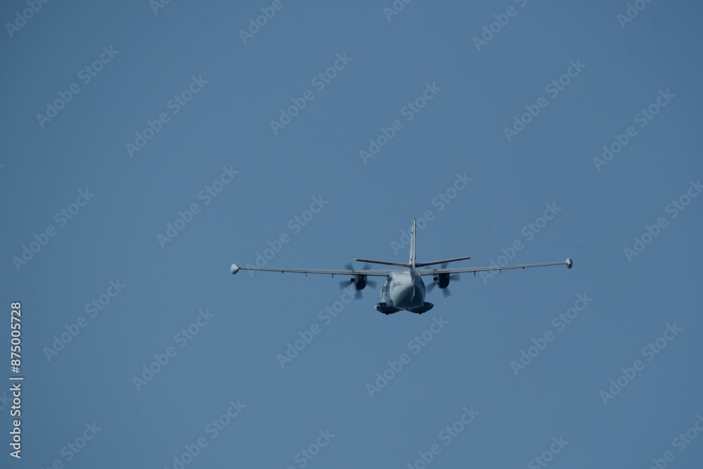 Twin-engine short-range transport aircraft in the cloudy sky. Twin-engine short-range transport aircraft in the cloudy sky.