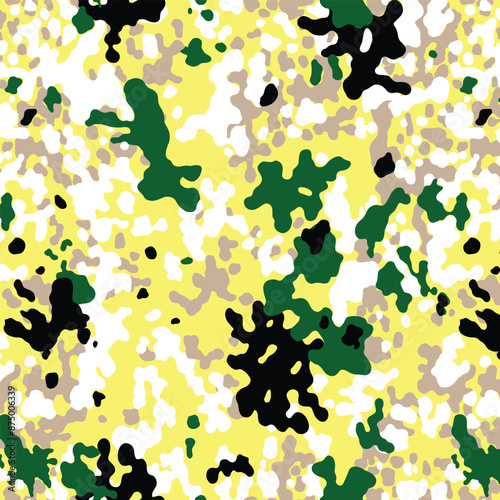 A colorful abstract pattern with green yellow black white and beige splatters creating a chaotic design look
