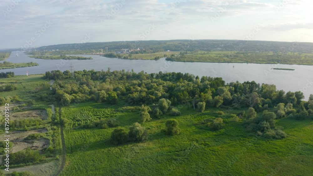 Aerial view coastline covered with dense forests. Flight over green trees on summer day. Nature landscape Aerial view coastline covered with dense forests. Flight over green trees on summer day. Nature landscape