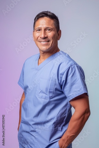 Portrait of a smiling male medical professional in scrubs