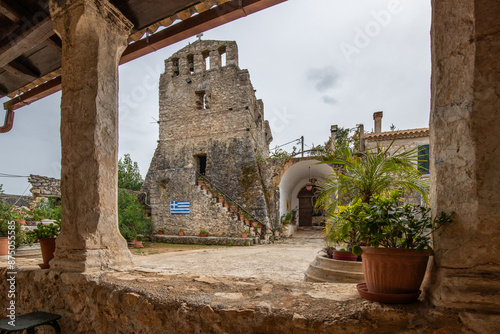 Great typical Greek monastery walls. Ruins in the Mediterranean architectural style of Greece. Sunset on 
Anafonitria monastery, Ionian Islands, Greece photo