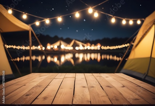 Wooden table top on blur tent camping travel tent at night.Drink and party concept.For montage product display or design key visual layout.View of copy space.
