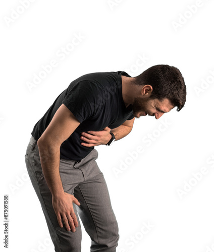 A man wearing a black shirt laughing a lot, holding his stomach. Isolated on white. photo