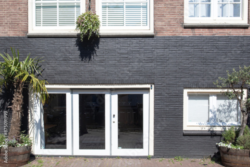 fachada de casa ladrillo y planta Ámsterdam