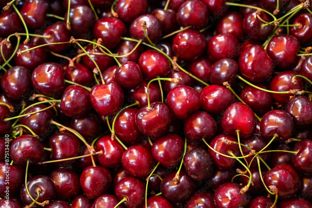 Delicious and fresh cherries on a market stall. Close-up of cherries. Organic fruit. Delicious and fresh cherries on a market stall. Close-up of cherries. Organic fruit.