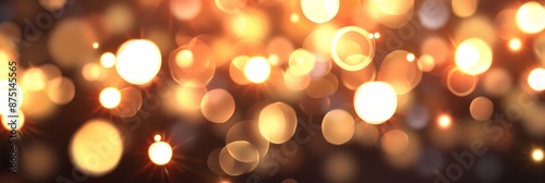 Abstract Bokeh Background with Glowing Golden Light Circles for Festive and Celebration Themes © Psykromia