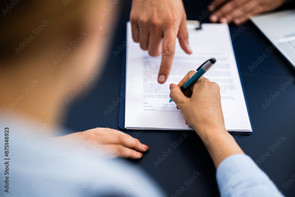 Pointing The Finger In Front Of A Person Signing With Golden Pen On The Document Pointing The Finger In Front Of A Person Signing With Golden Pen On The Document