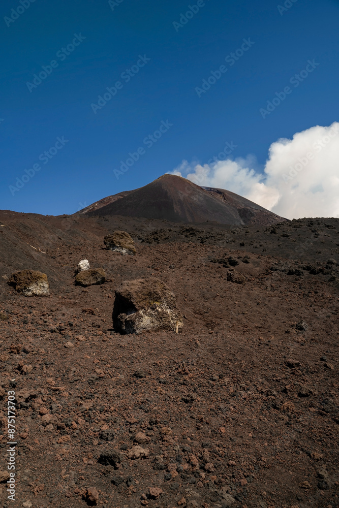 Mount Etna, Sicily - Tallest active volcano of Europe 3329 m in Italy. wide view of the active volcano Etna, extinct craters on the slope, traces of volcanic activity.